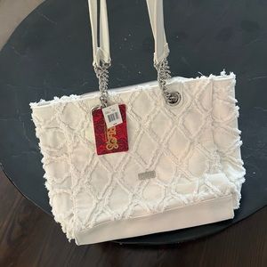 White Carlos by Carlos Santana bag